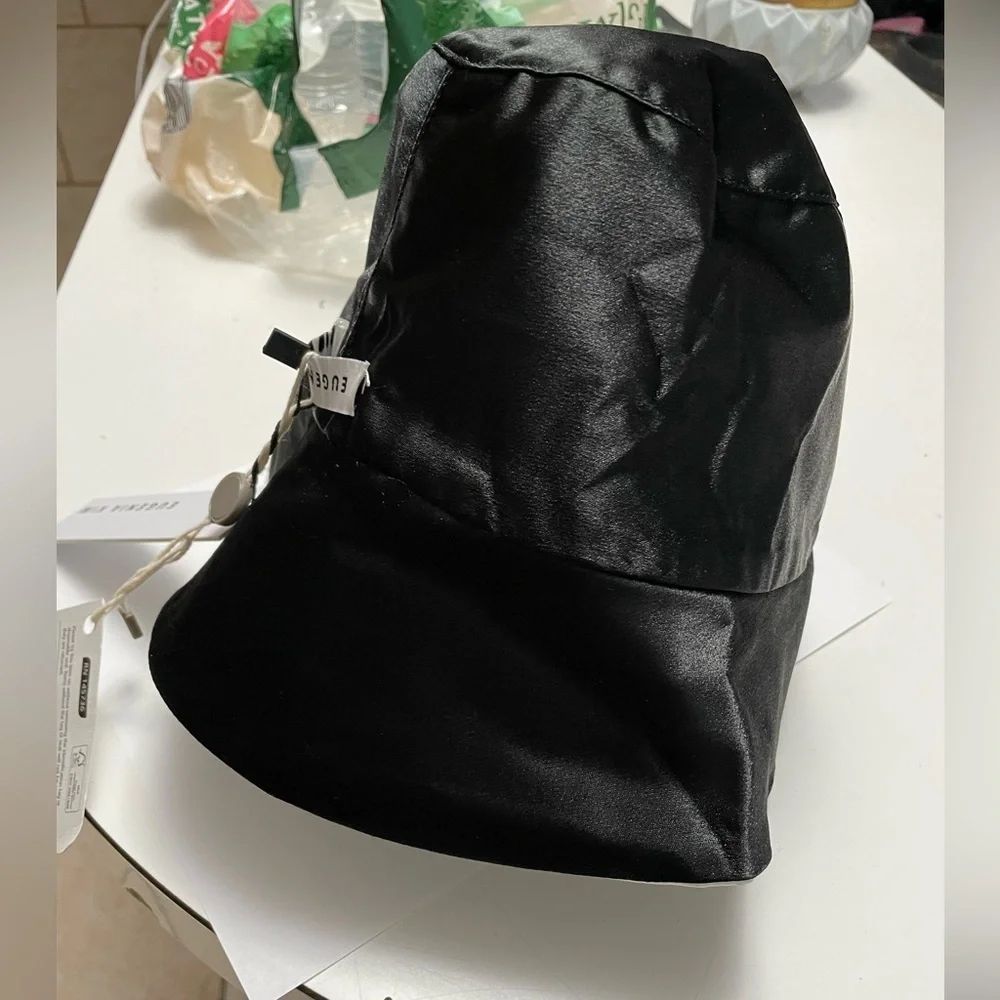 Eugenia Kim Satin Reversible Bucket Hat.